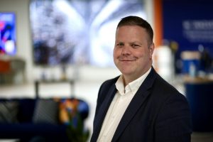 Few sectors have felt disruption as acutely as retail. With volatile demand, labour shortages and rising costs, retail supply chains are buckling under pressure, especially when seasonal peaks hit. Scott Merrick discusses how technology can help and how it interplays with employees.