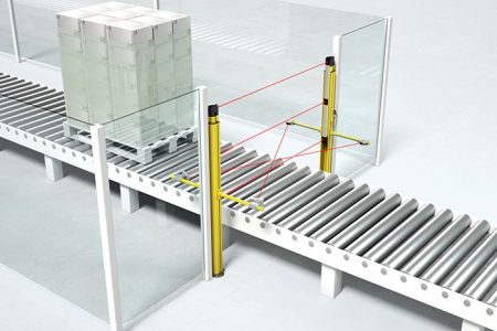 Muting allows the safety function on machines or systems to be temporarily bypassed so that material can be fed in or out through protective devices such as light curtains or laser scanners without interrupting the production process.